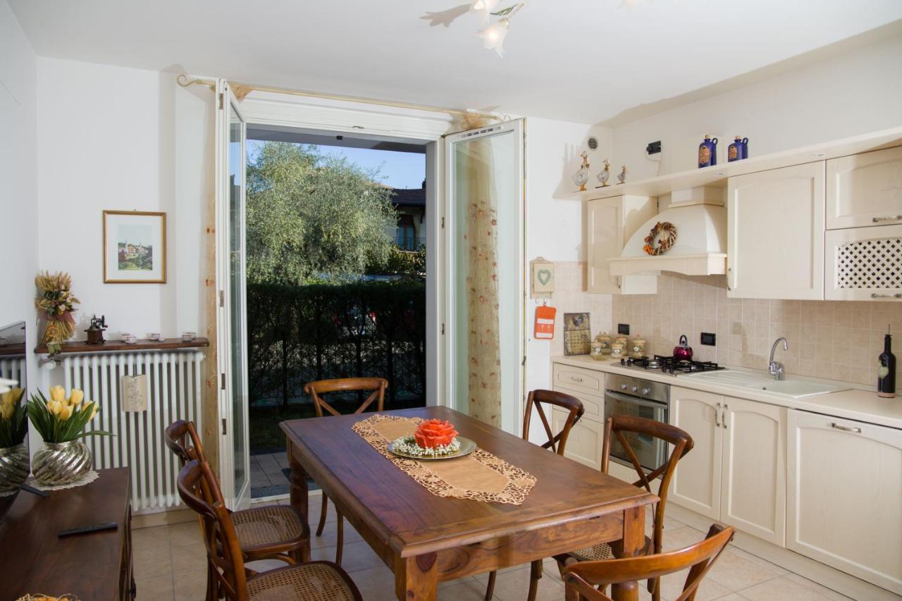 Appartamento Con Giardino E Parcheggio Privato Беладжо Екстериор снимка